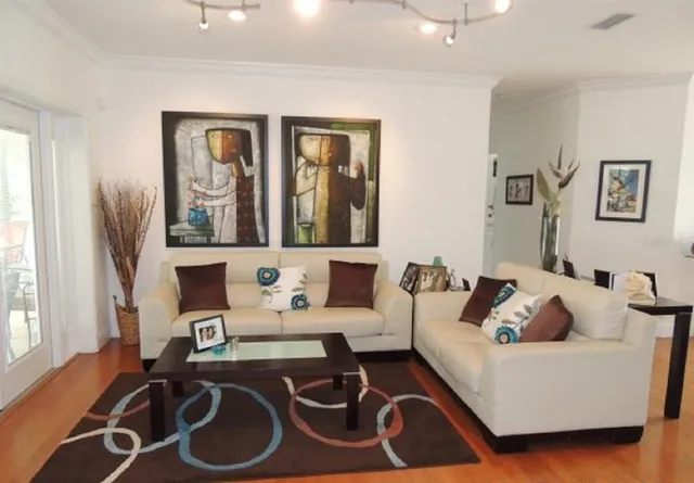 a living room with furniture and a window
