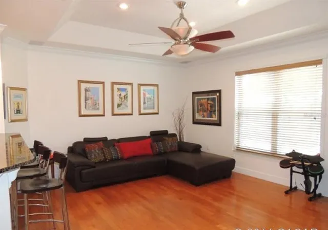 a living room with furniture and a window
