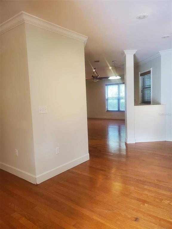 14228 Northwest 23 Lane Gainesville, FL 32606 - Photo 10 of 17 a view of empty room with wooden floor