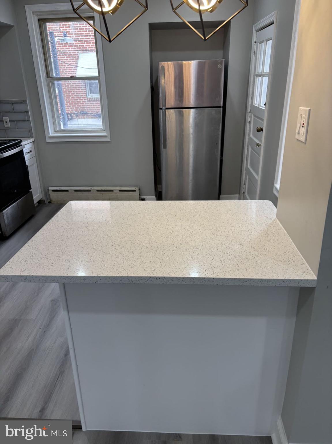 4007 Higbee Street Philadelphia, PA 19135 - Photo 13 of 20 a refrigerator freezer sitting inside of a kitchen
