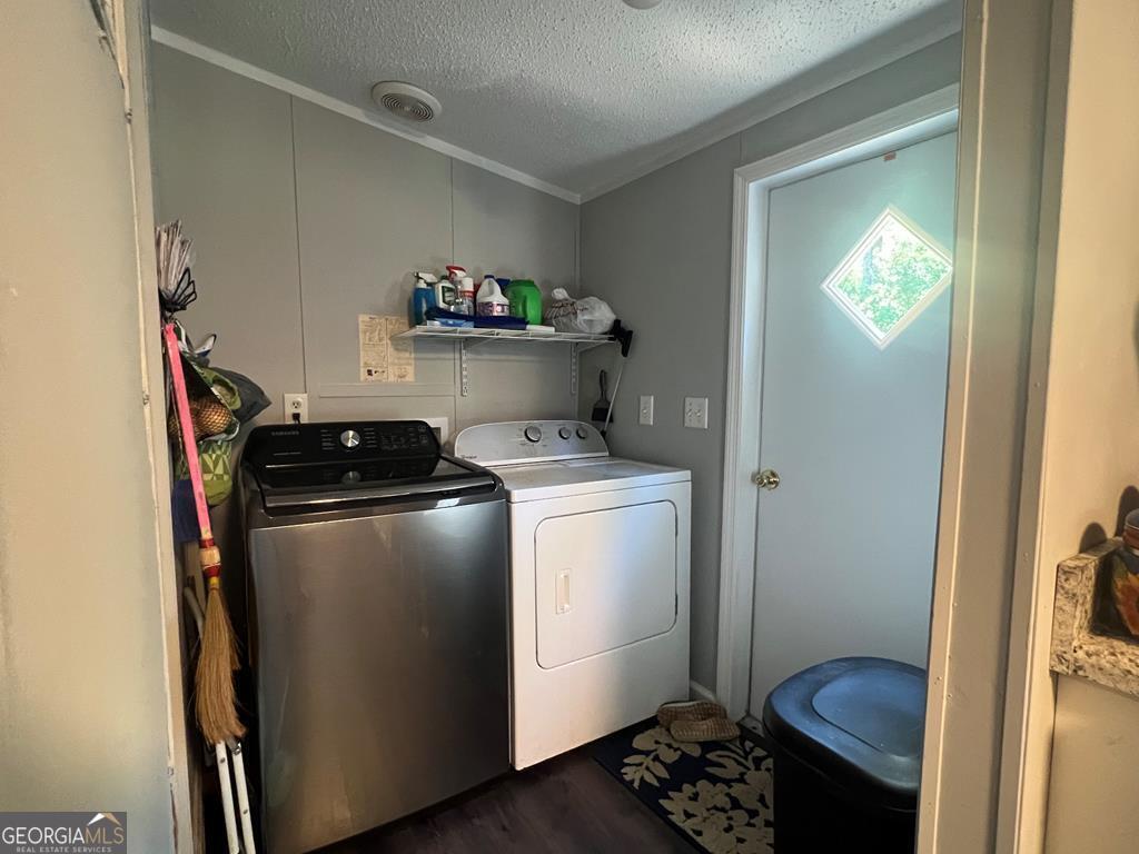 166 Pebble Hills Road Cochran, GA 31014 - Photo 12 of 22 a room with storage and utility