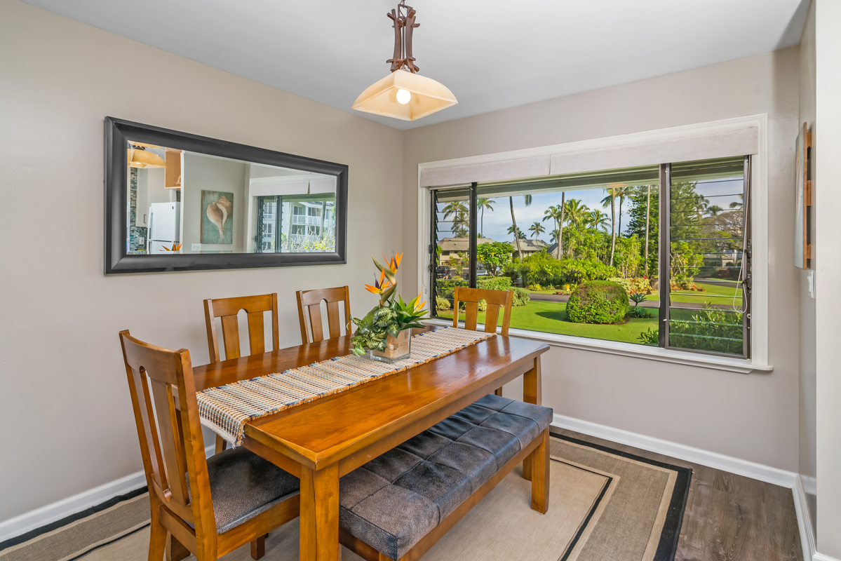 3830 Edward Road, Unit 9F Princeville, HI 96722 - Photo 8 of 20 a room with furniture and a window