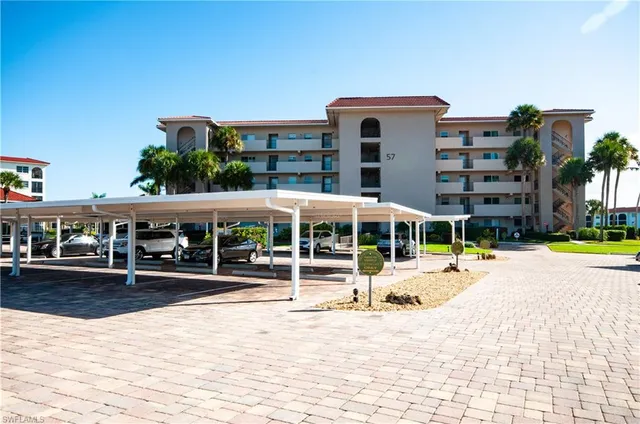 a view of a building with a patio