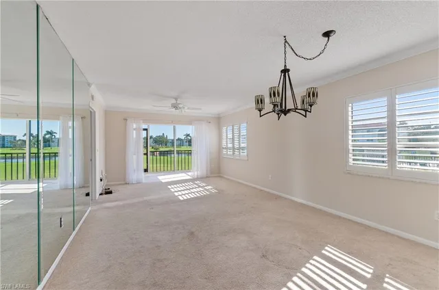 a view of empty room with floor to ceiling window