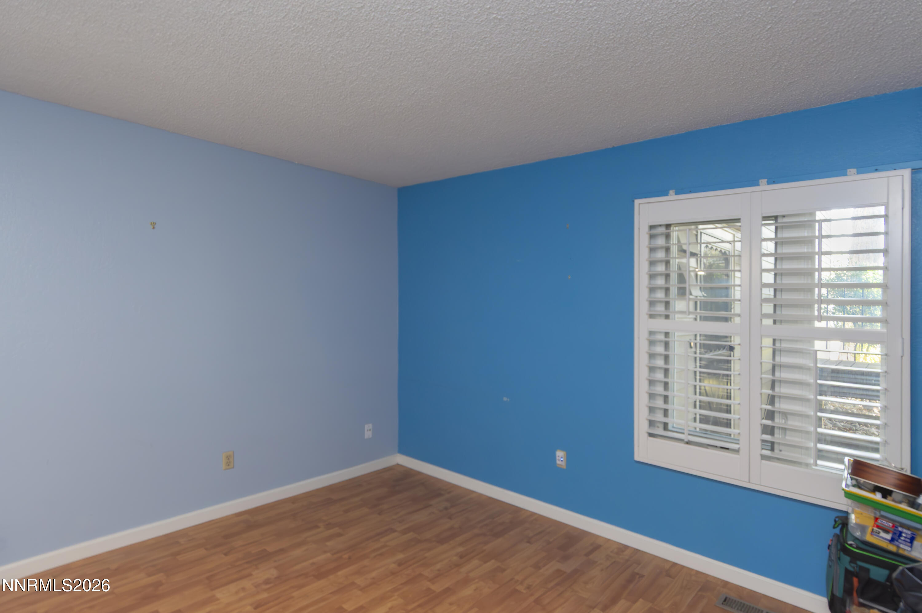 2317 Roundhouse Road Sparks, NV 89431 - Photo 11 of 14 a view of an empty room with a window
