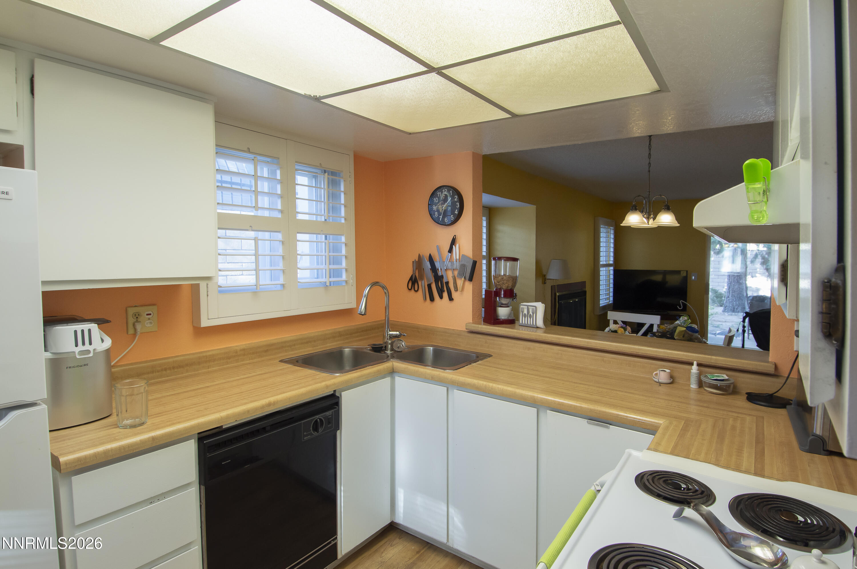 2317 Roundhouse Road Sparks, NV 89431 - Photo 9 of 14 a kitchen with a sink cabinets and window