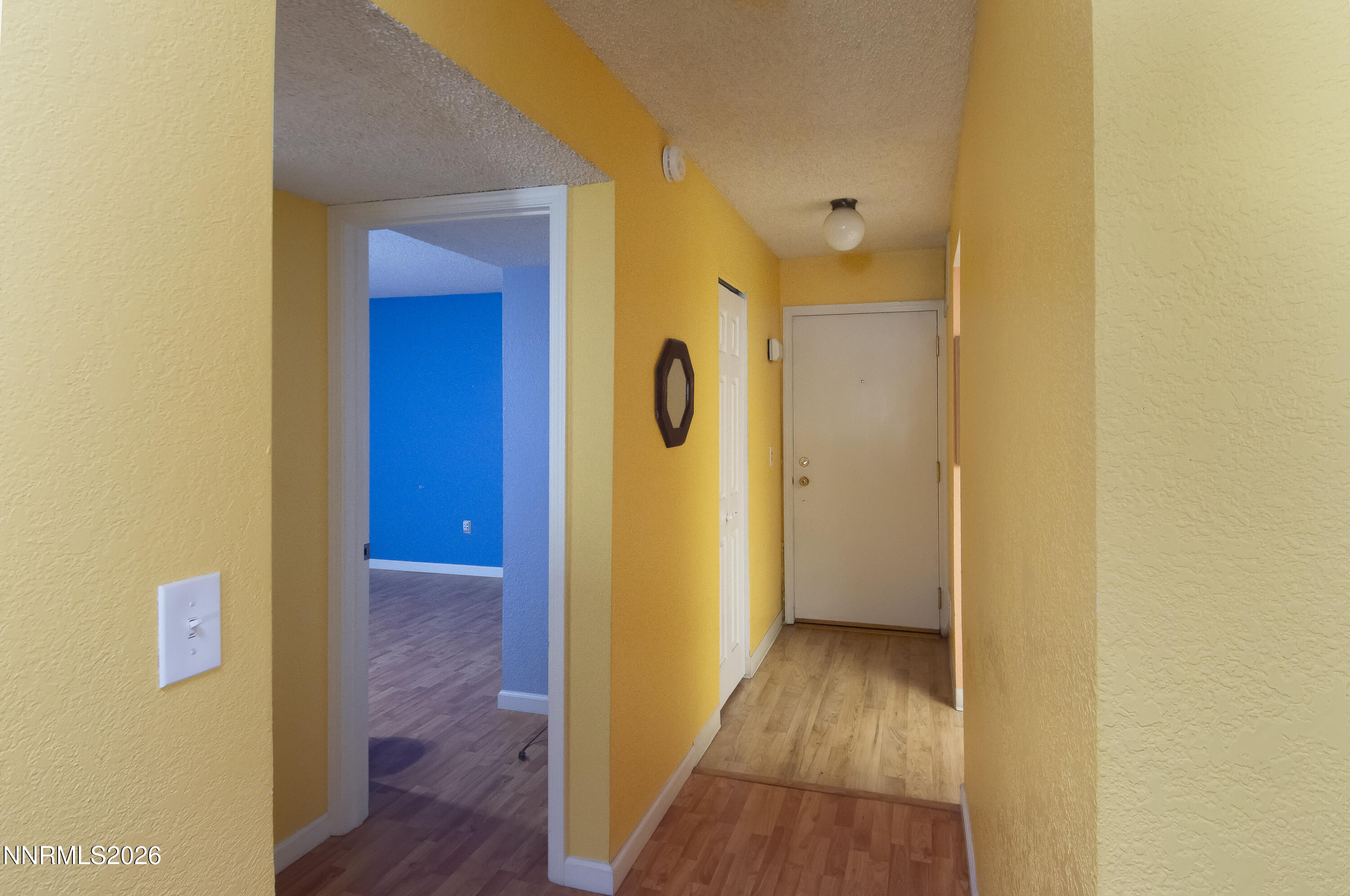 2317 Roundhouse Road Sparks, NV 89431 - Photo 10 of 14 a view of a hallway with wooden floor