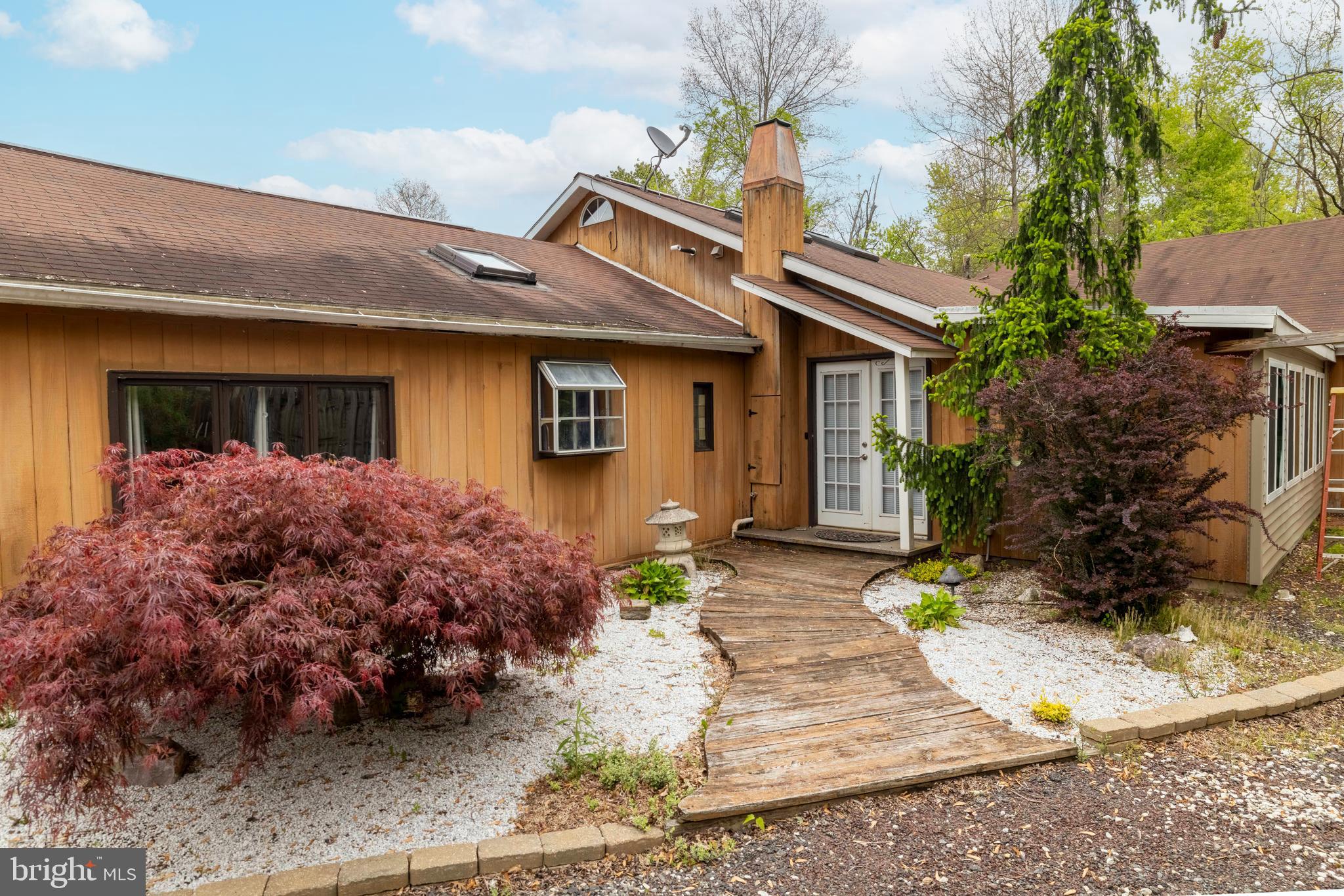 271 Old Croton Road Flemington, NJ 08822 - Photo 10 of 34 a front view of a house with garden