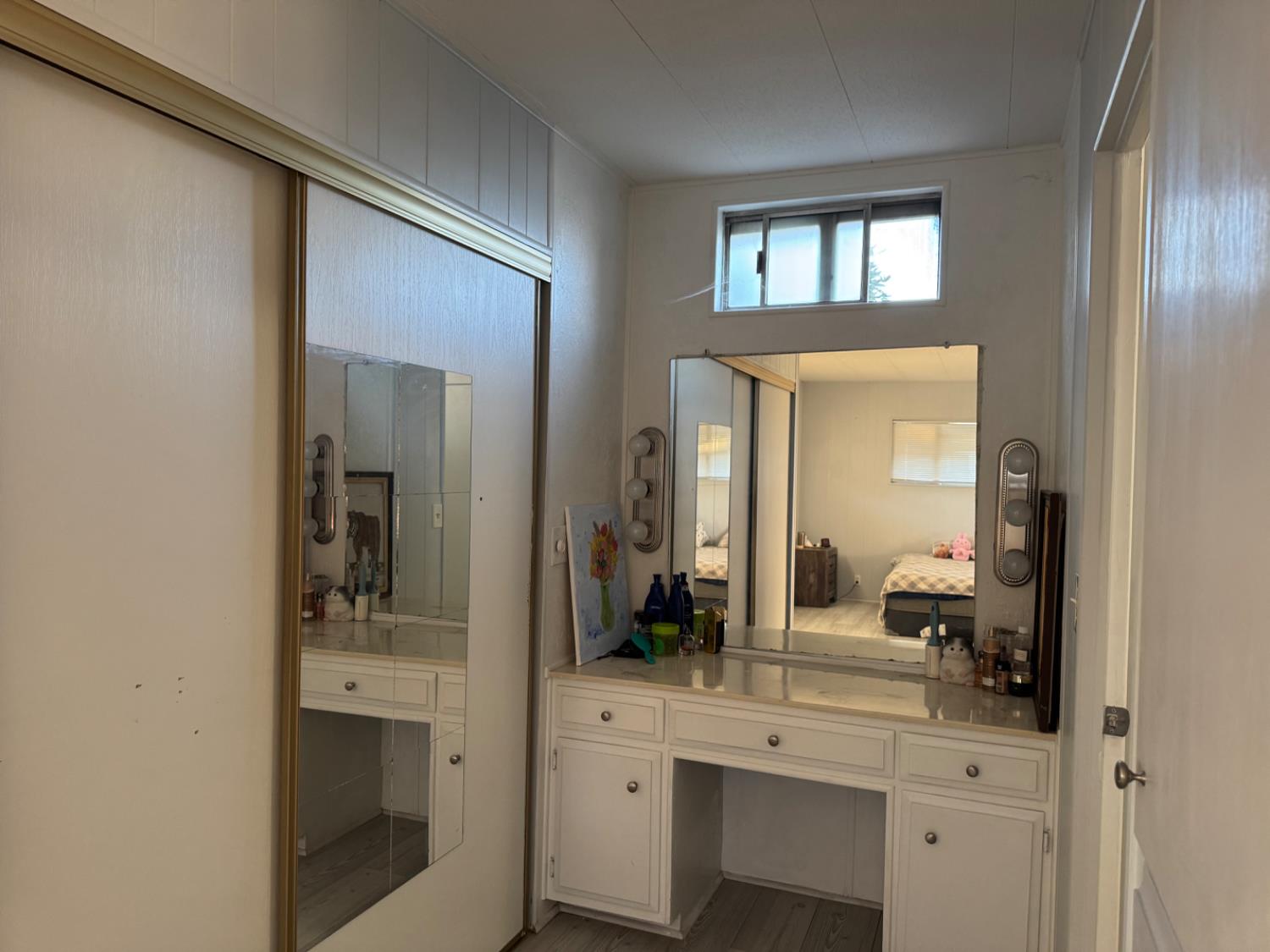 10035 Mills Station Road, Unit 161 Sacramento, CA 95827 - Photo 13 of 15 a en suite bathroom with a sink and a mirror