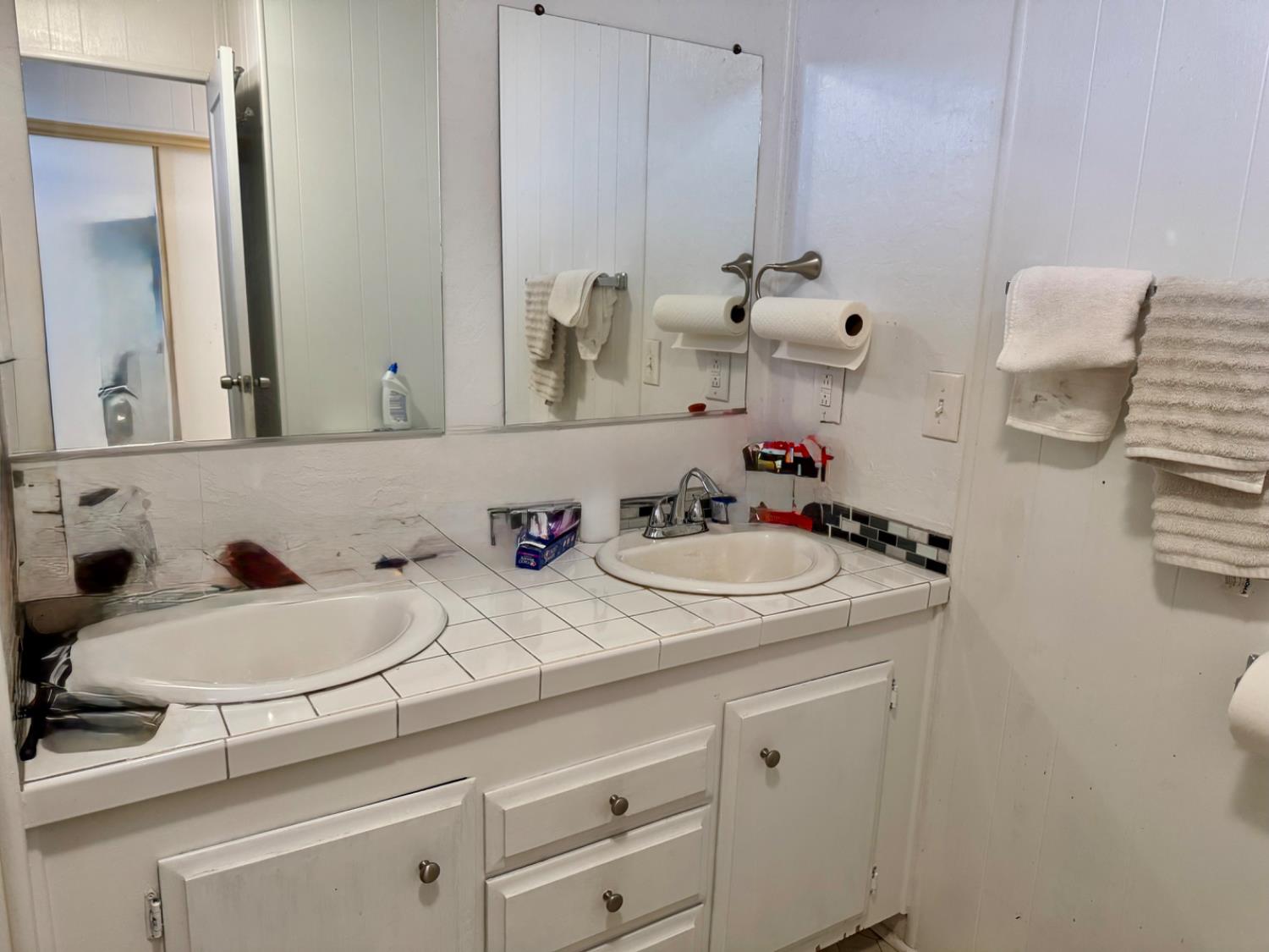 10035 Mills Station Road, Unit 161 Sacramento, CA 95827 - Photo 15 of 15 a bathroom with a sink and a mirror