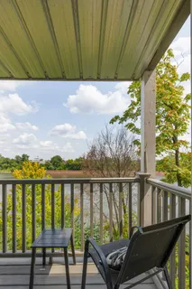 a view of a street view from a balcony
