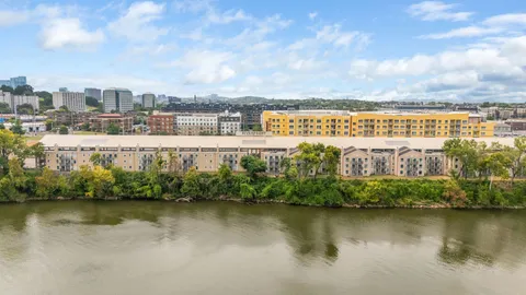 a view of a lake with a city