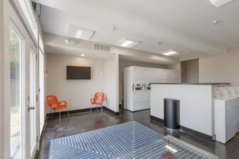 a very nice looking room with a white bed