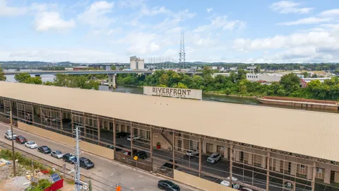 a view of a lake with a city skyline in the background