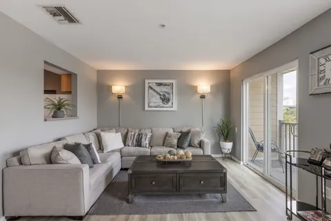 a living room with furniture and a couch