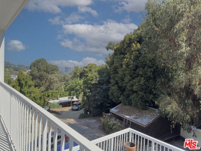 a balcony with an outdoor space