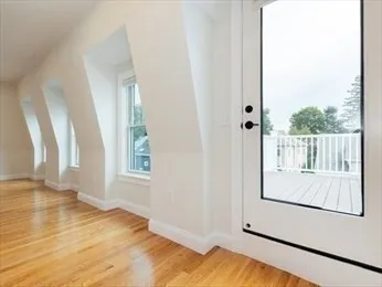 a view of a room that has a window in it
