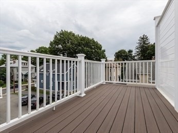 210 Adams Street, Unit 4 Waltham, MA 02453 - Photo 21 of 25 a view of wooden deck