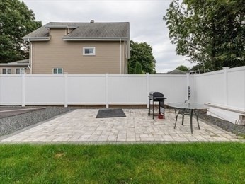 210 Adams Street, Unit 4 Waltham, MA 02453 - Photo 25 of 25 a view of outdoor space yard and patio