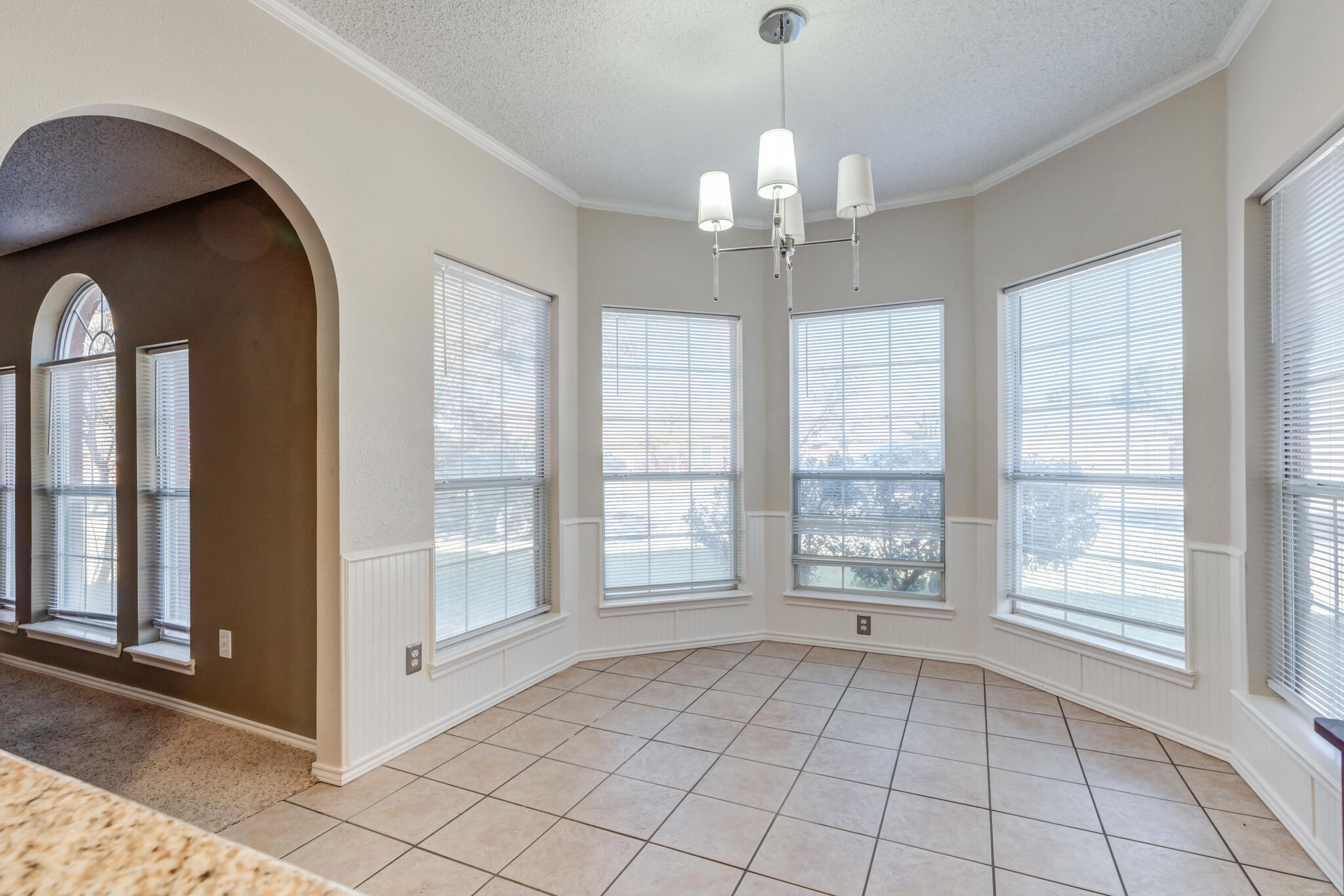 5917 88th Place Lubbock, TX 79424 - Photo 20 of 45 a view of an empty room with a window