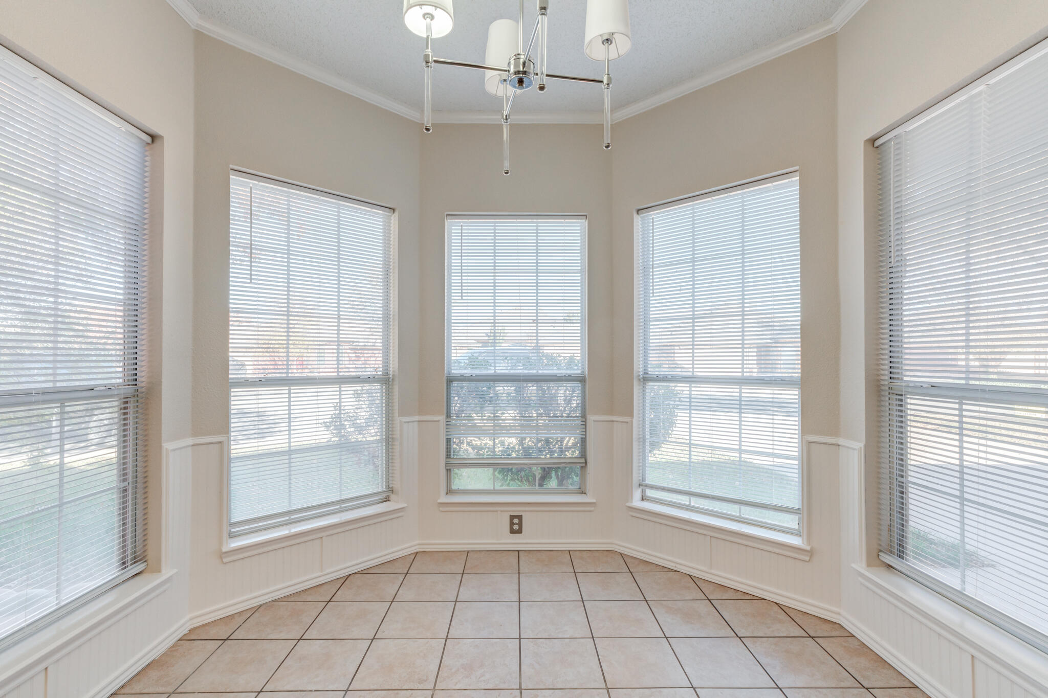 5917 88th Place Lubbock, TX 79424 - Photo 21 of 45 a view of an empty room with a window