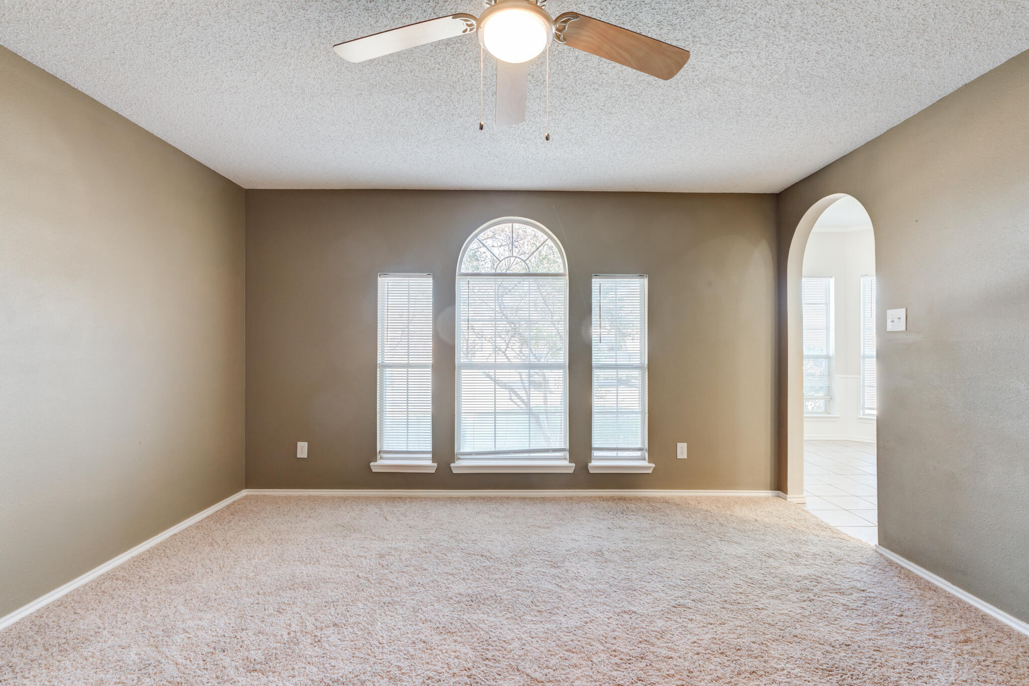 5917 88th Place Lubbock, TX 79424 - Photo 22 of 45 an empty room with a window