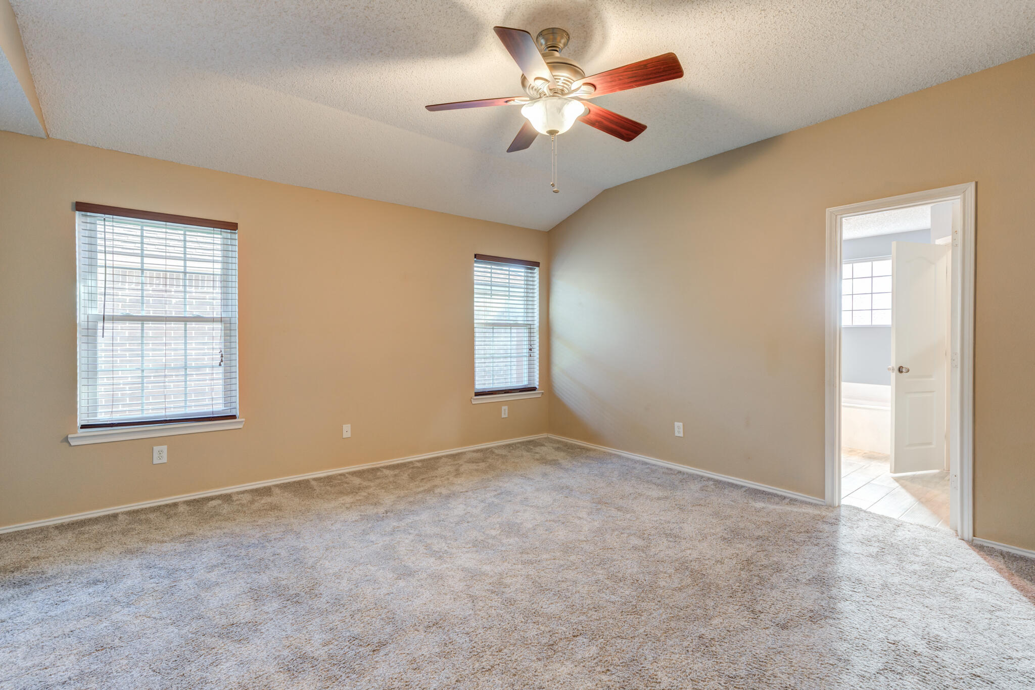 5917 88th Place Lubbock, TX 79424 - Photo 26 of 45 a view of an empty room with a window