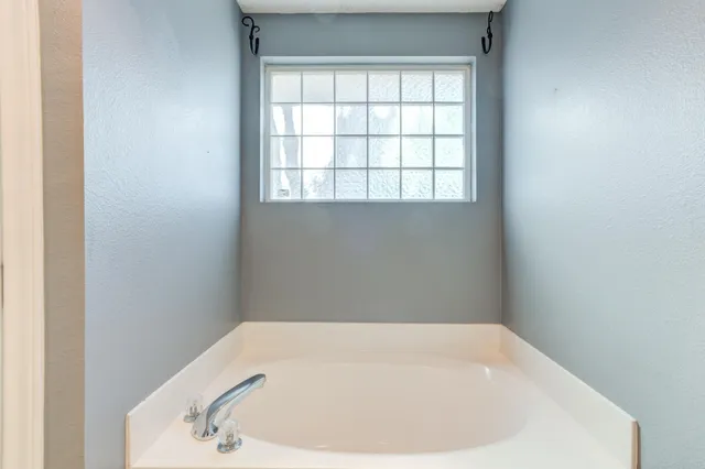 a bathroom with a tub