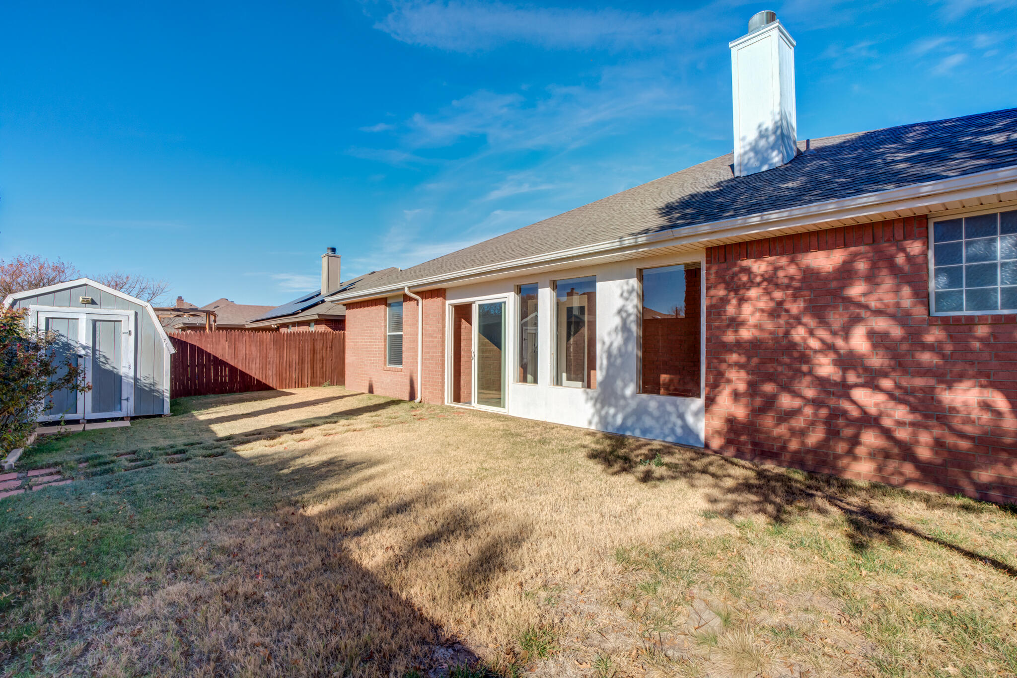 5917 88th Place Lubbock, TX 79424 - Photo 42 of 45 a view of a house with a yard