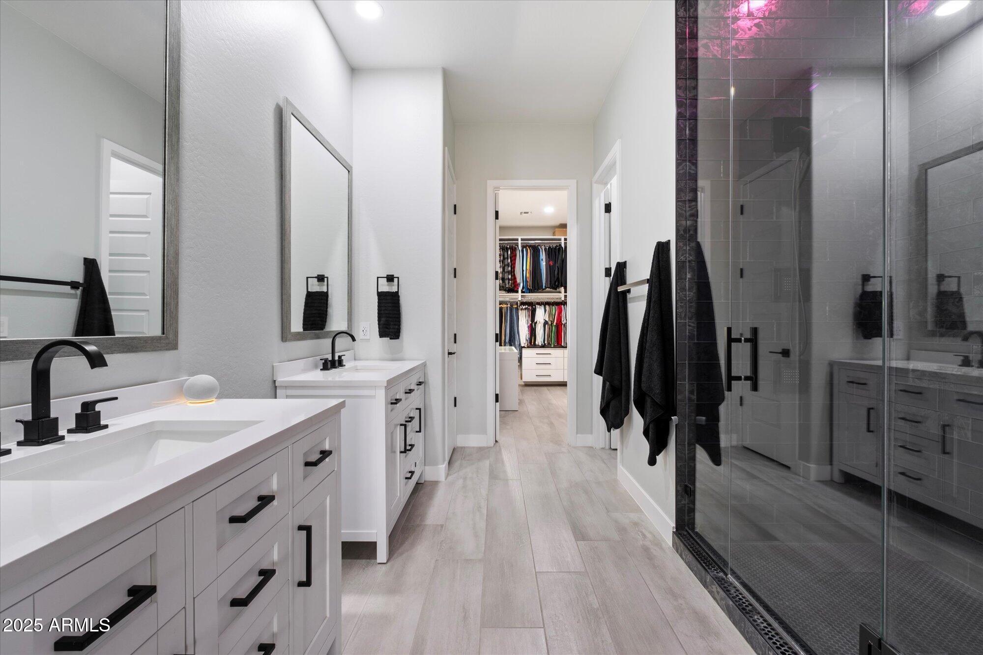20954 East Camacho Road Queen Creek, AZ 85142 - Photo 14 of 35 a bathroom with double vanity sink and a mirror