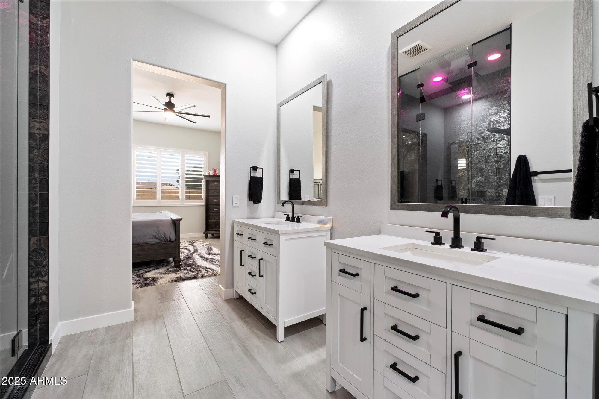 20954 East Camacho Road Queen Creek, AZ 85142 - Photo 15 of 35 a bathroom with a double vanity sink mirror and