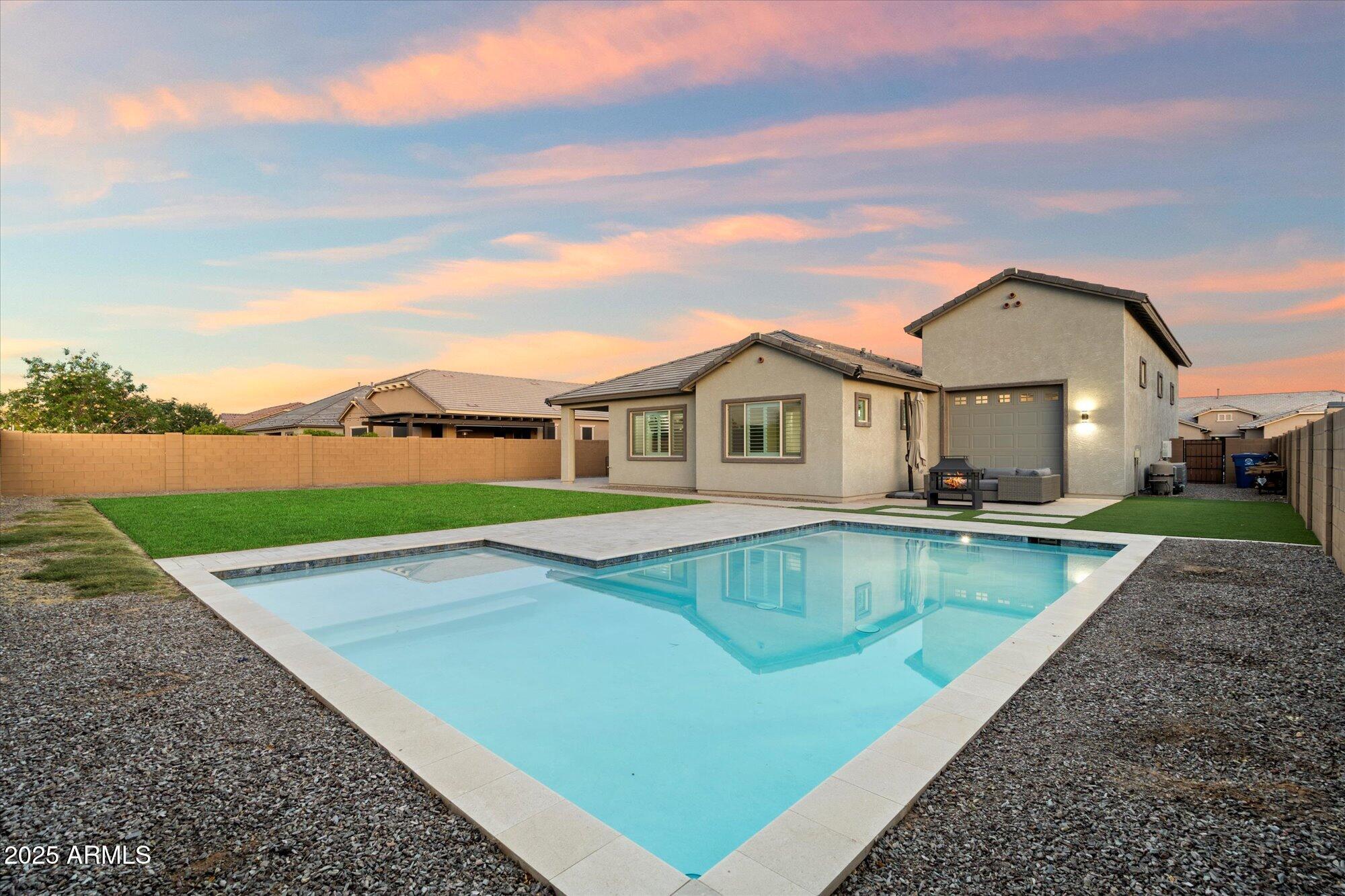 20954 East Camacho Road Queen Creek, AZ 85142 - Photo 22 of 35 a view of a house with swimming pool and view of a lake