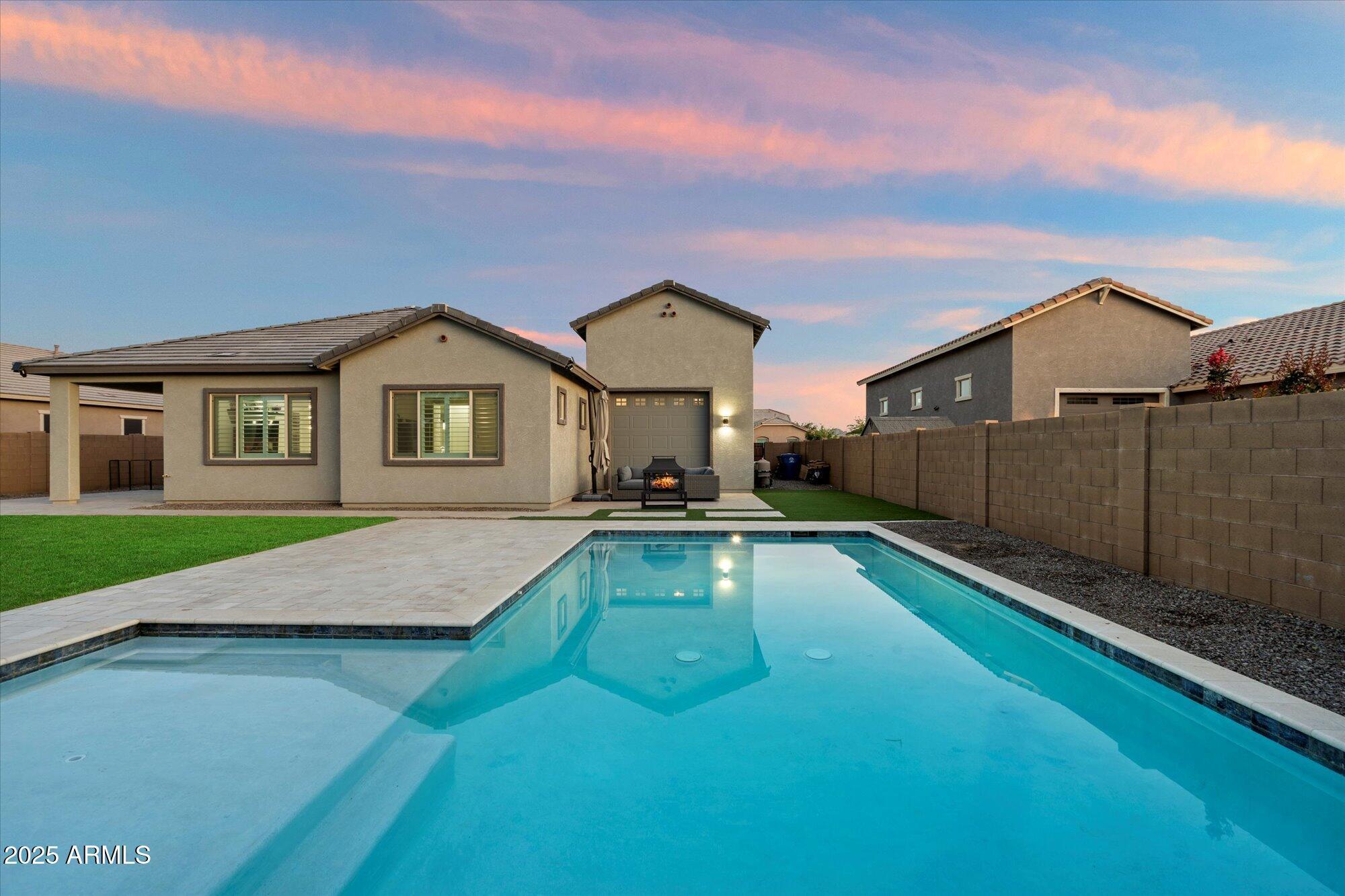20954 East Camacho Road Queen Creek, AZ 85142 - Photo 23 of 35 a view of house with yard entertaining space