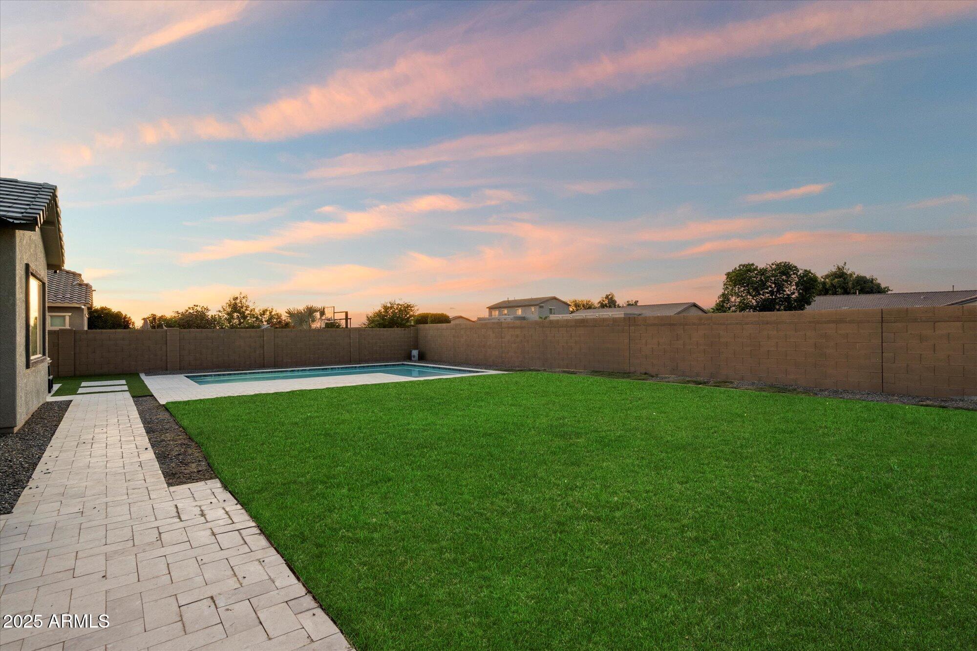 20954 East Camacho Road Queen Creek, AZ 85142 - Photo 30 of 35 a view of grassy field with ocean