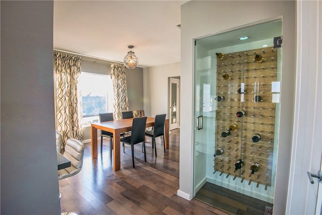 a view of walk in closet with white walls