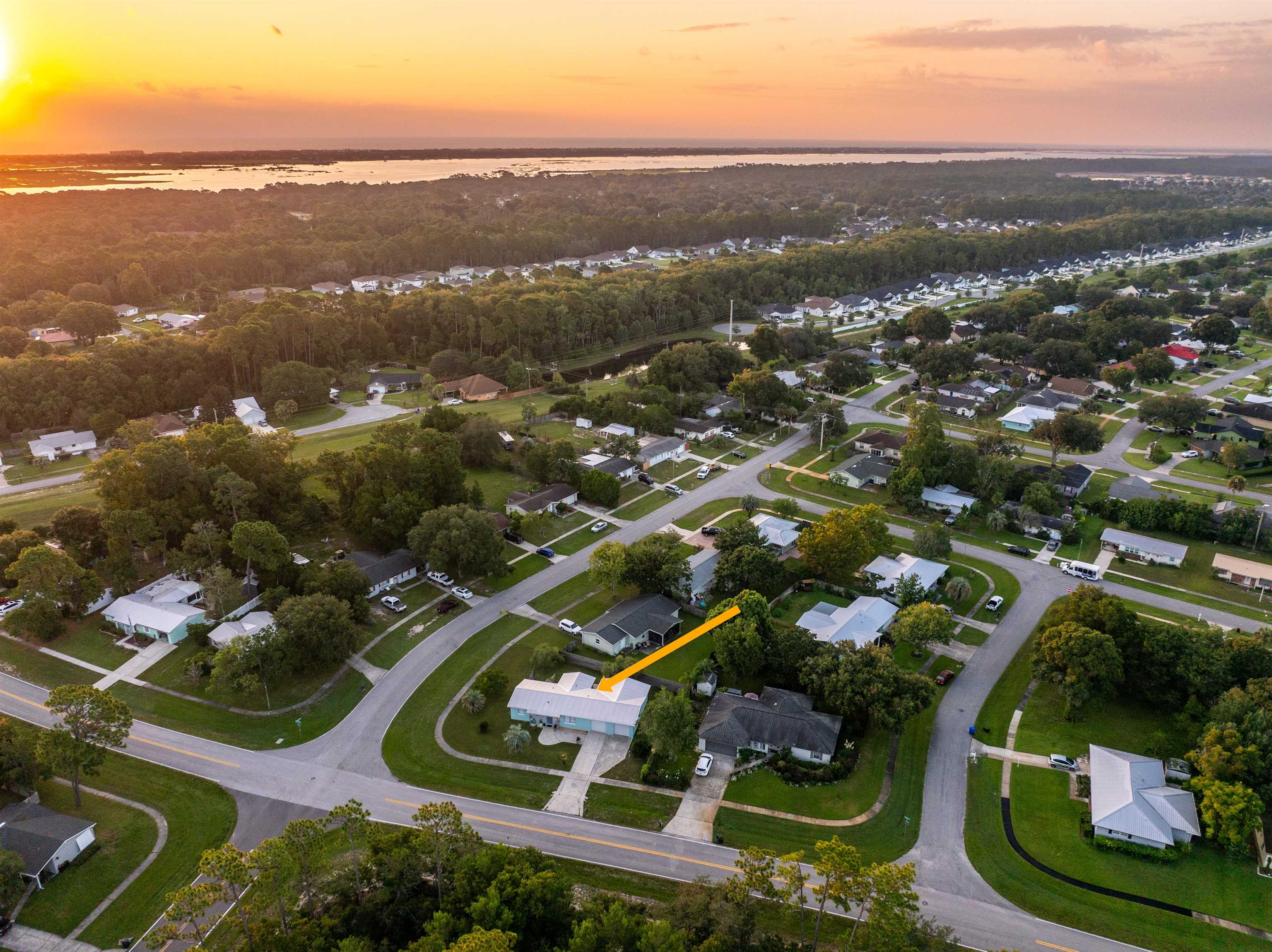 311 Deltona Boulevard St. Augustine, FL 32086 - Photo 16 of 16 an aerial view of residential houses with outdoor space