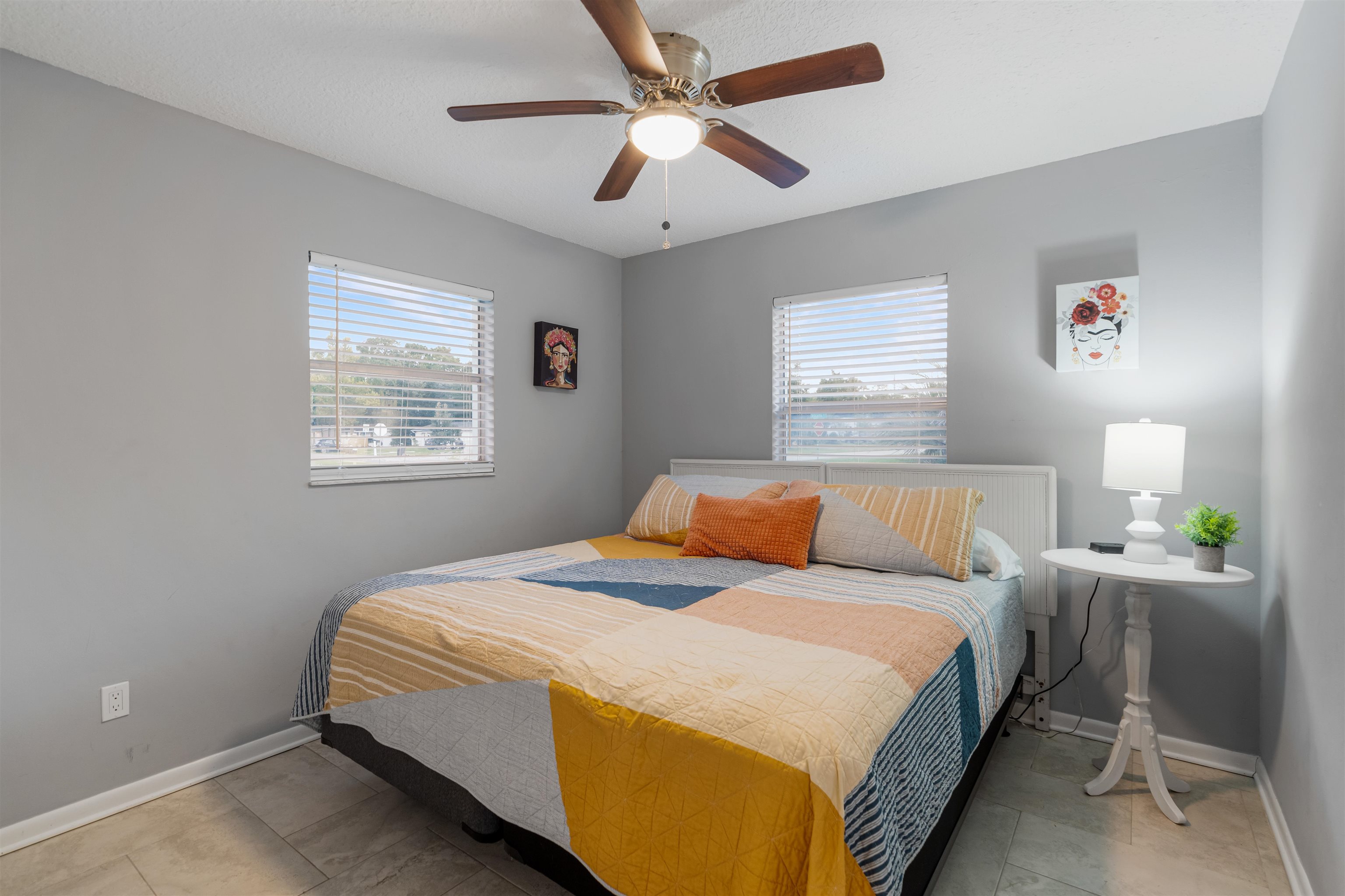 311 Deltona Boulevard St. Augustine, FL 32086 - Photo 9 of 16 a bedroom with a bed and a window