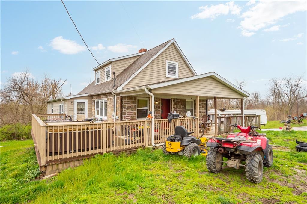 571 Highland Ridge Road Marianna, PA 15345 - Photo 20 of 25 a front view of a house with patio