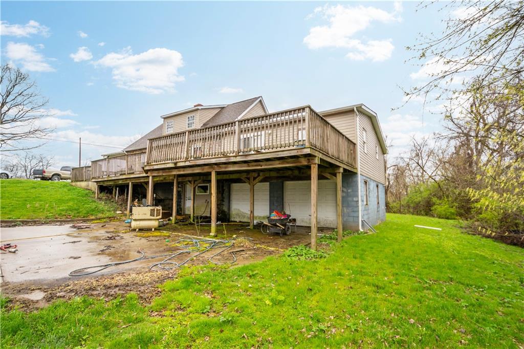 571 Highland Ridge Road Marianna, PA 15345 - Photo 21 of 25 a view of a house with yard and porch