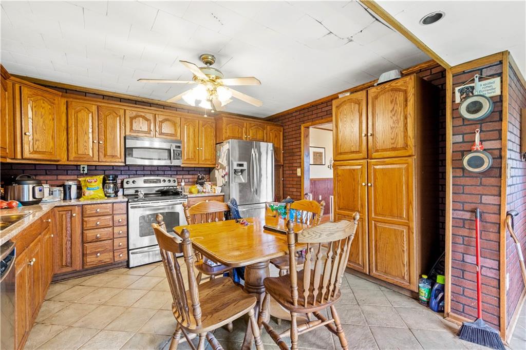571 Highland Ridge Road Marianna, PA 15345 - Photo 5 of 25 a dining room filled counter top space and stainless steel appliances
