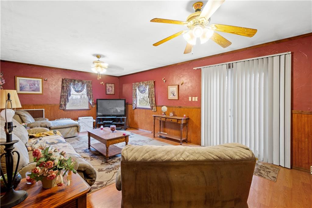 571 Highland Ridge Road Marianna, PA 15345 - Photo 8 of 25 a bed room with a bed and a chair