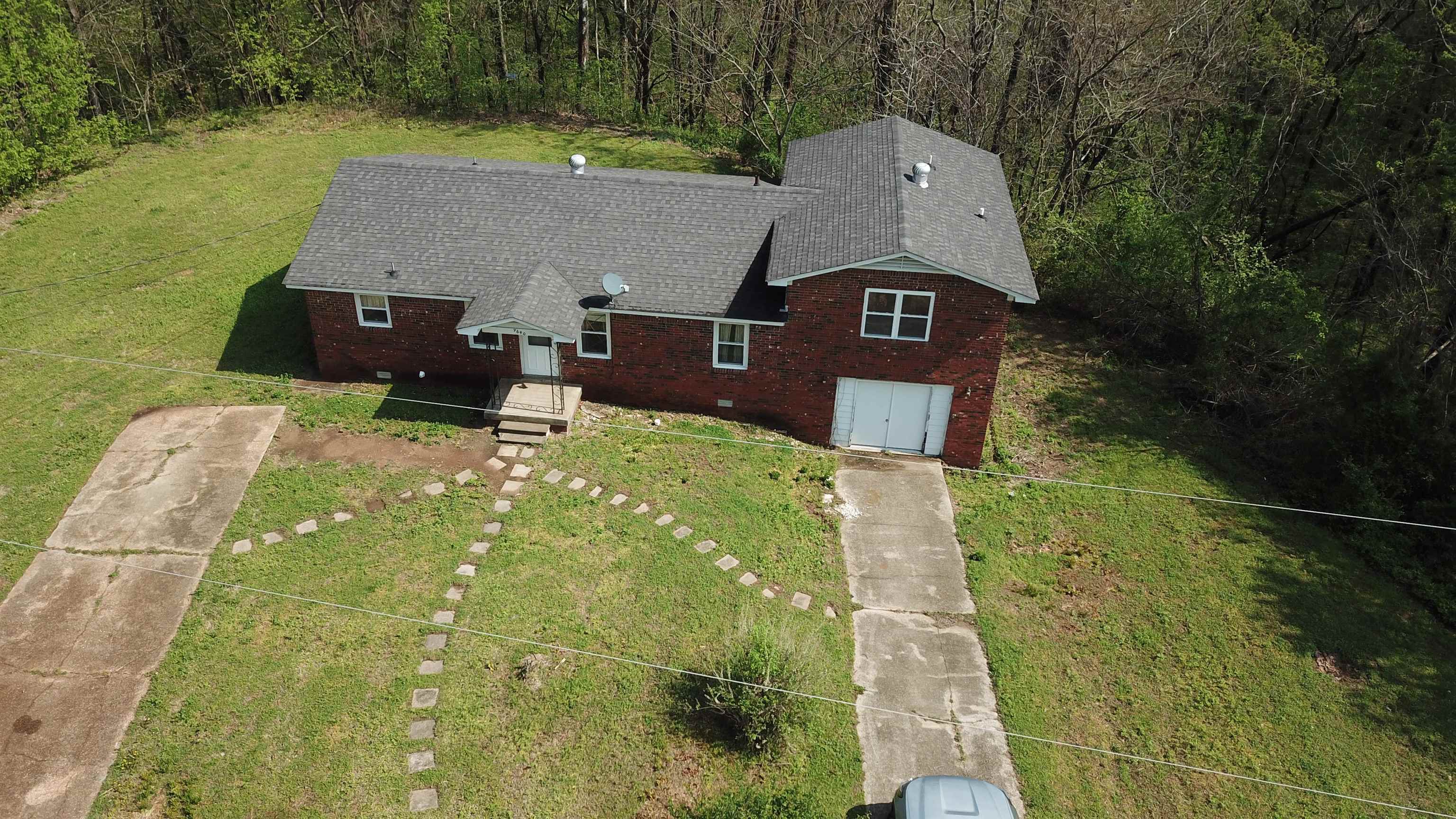 9640 New Bethel Road Millington, TN 38053 - Photo 11 of 22 an aerial view of a house with a yard
