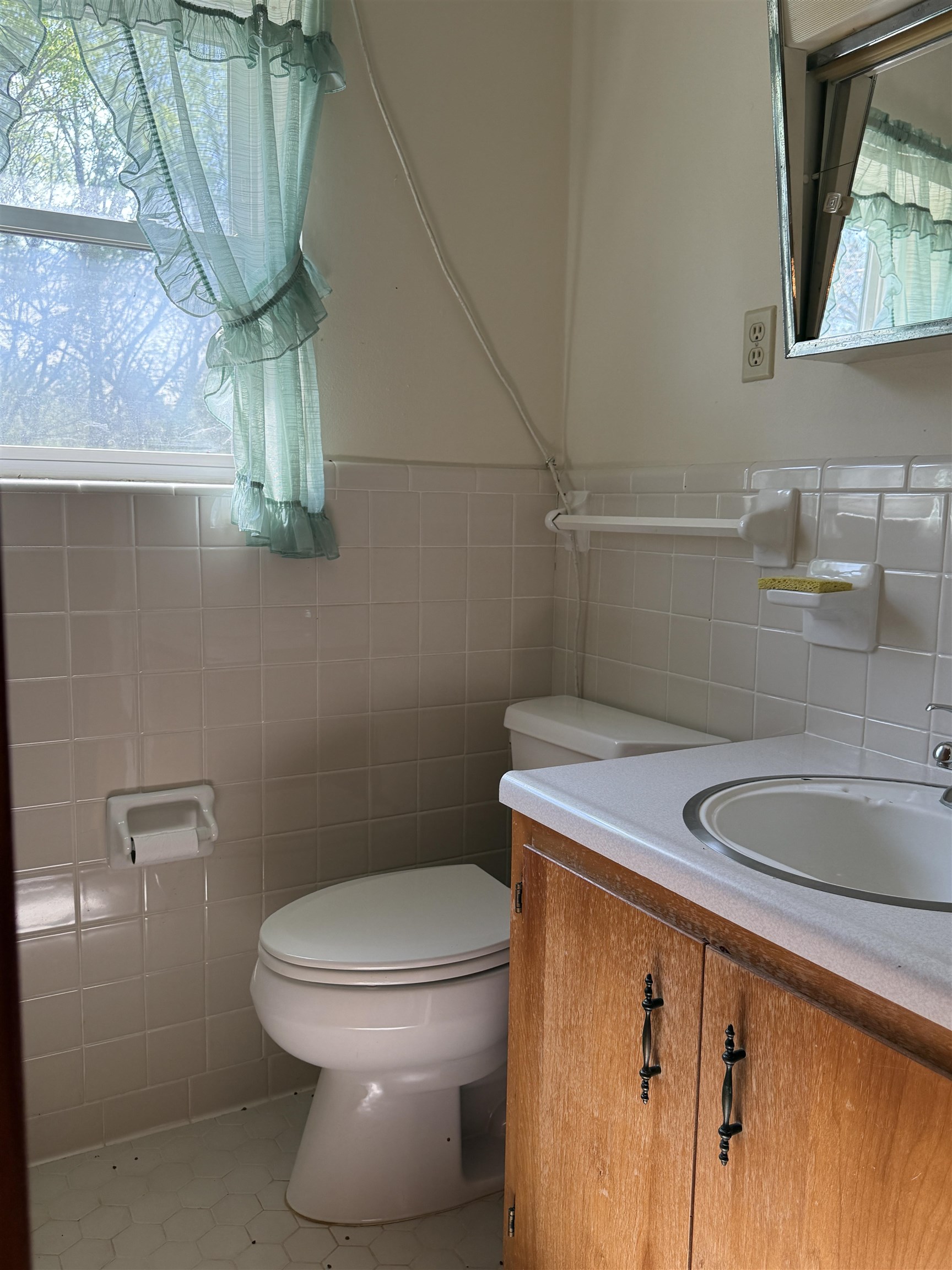 9640 New Bethel Road Millington, TN 38053 - Photo 20 of 22 a bathroom with a granite countertop sink a toilet and mirror