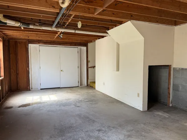 a view of a room with an empty space