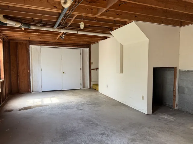 a view of a room with an empty space