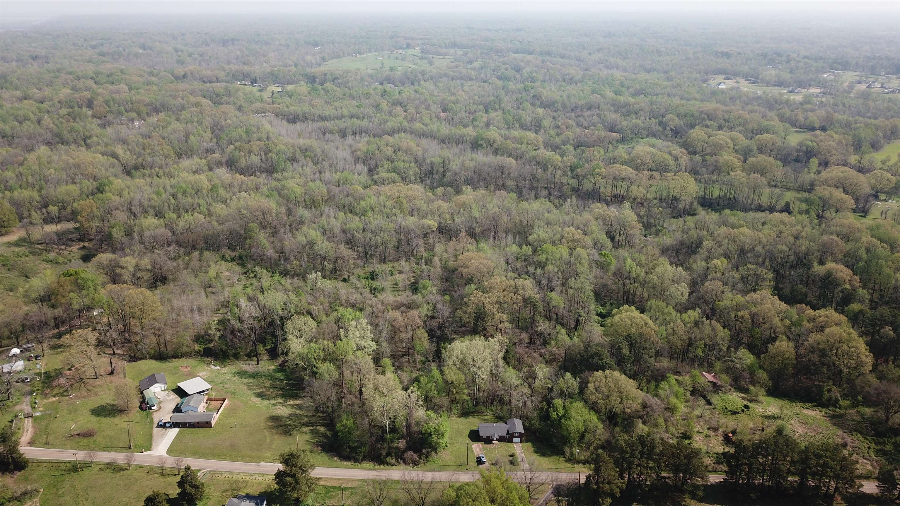 9640 New Bethel Road Millington, TN 38053 - Photo 7 of 22 an aerial view of a house with a yard