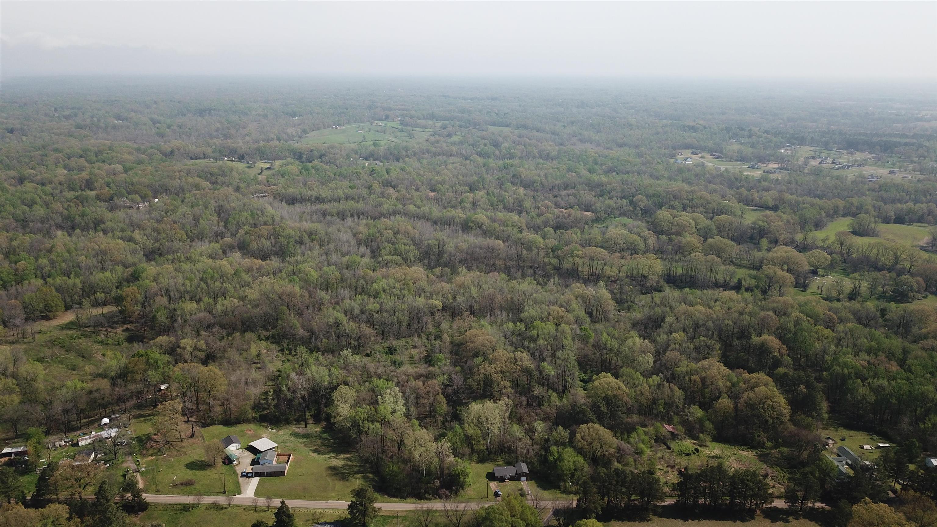 9640 New Bethel Road Millington, TN 38053 - Photo 8 of 22 an aerial view of house with yard and mountain view in back