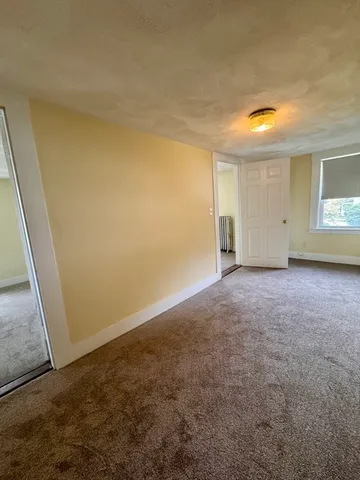 an empty room with an entryway