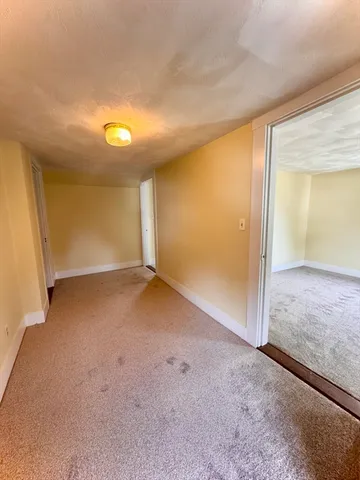 an empty room with a natural light