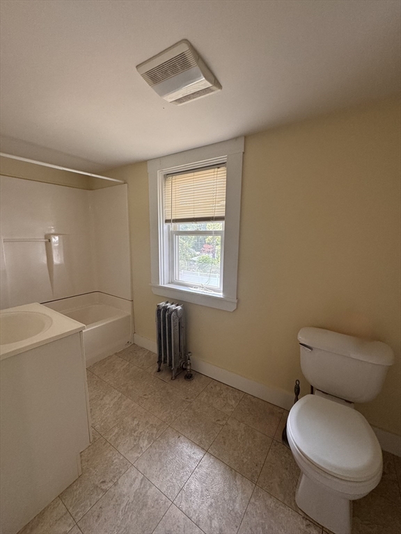 57 Adams Avenue Newton, MA 02465 - Photo 35 of 38 a bathroom with a toilet sink and bathtub